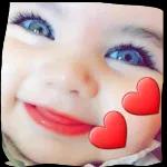 Her little baby cheeks are so cute!